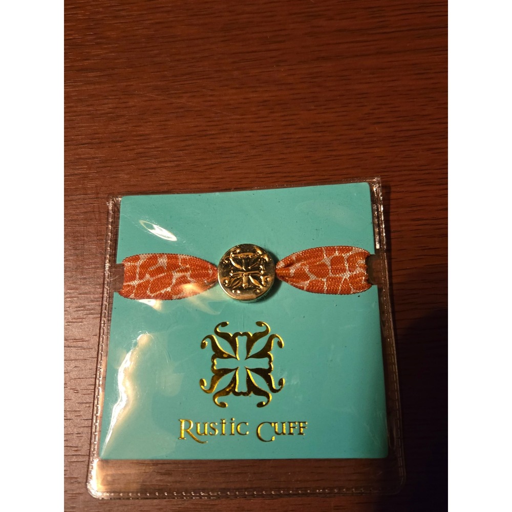 Rustic Cuff Orange Giraffe Print‎ Elastic Hair Tie Bracelet Gold Logo Medallion